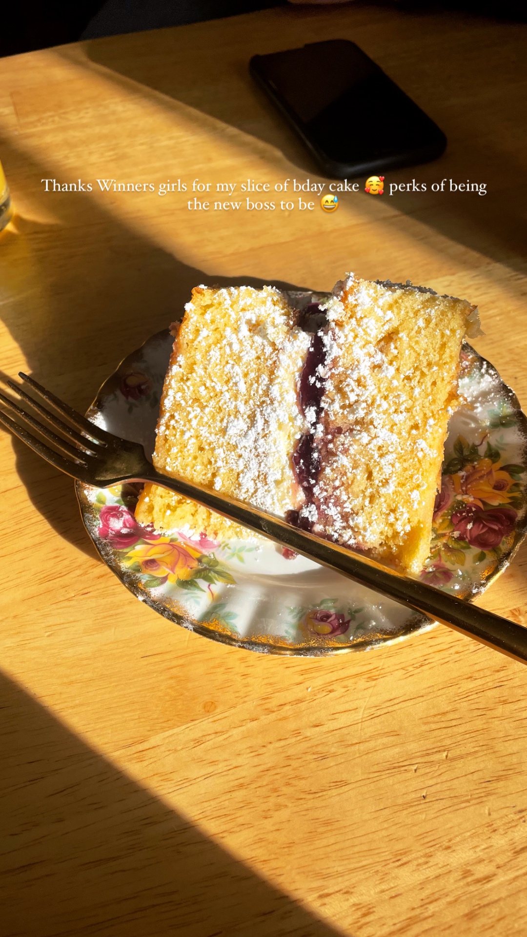 Slice of Victoria sponge dusted with icing sugar